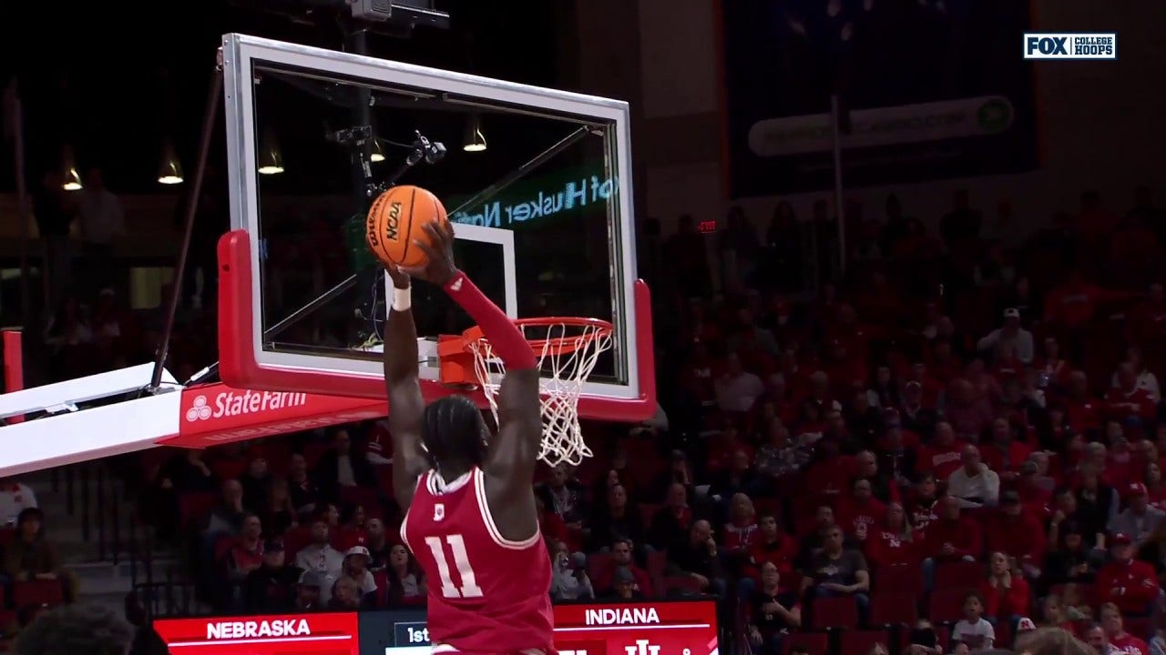 Oumar Ballo throws down the alley-oop jam, extending Indiana's lead over Nebraska