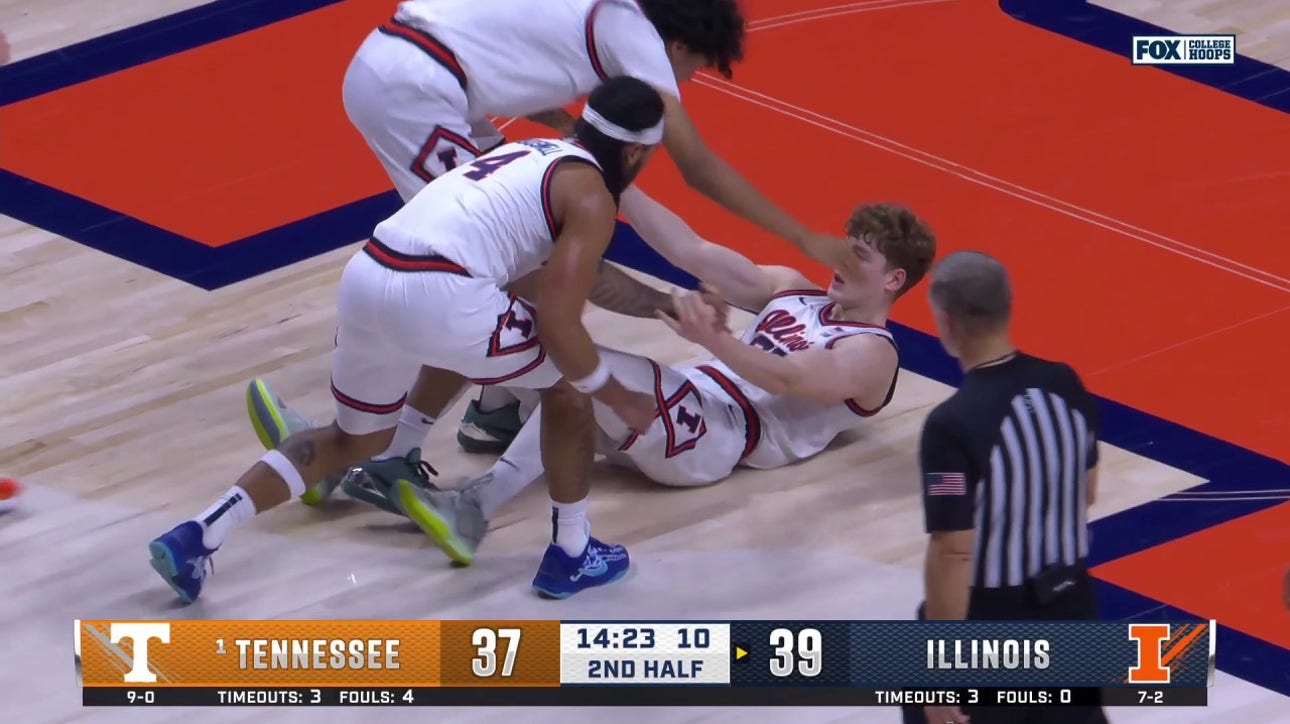 Kasparas Jakučionis drills a 3-pointer through contact, extending Illinois' lead over Tennessee