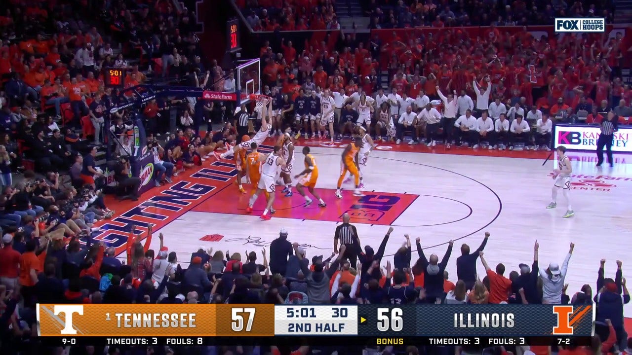 Ben Humrichous flies in for the putback slam to give Illinois the lead over Tennessee