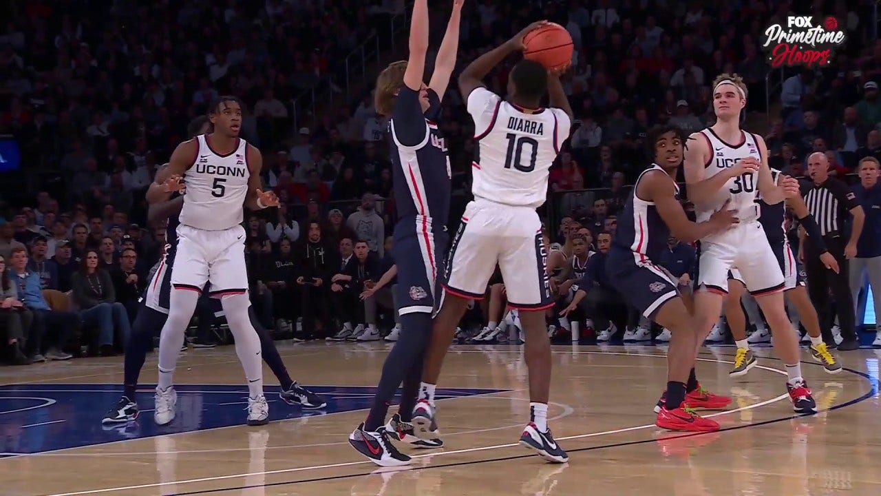 Hassan Diarra drains a TOUGH 3-pointer to beat the shot clock, extending UConn's lead over Gonzaga