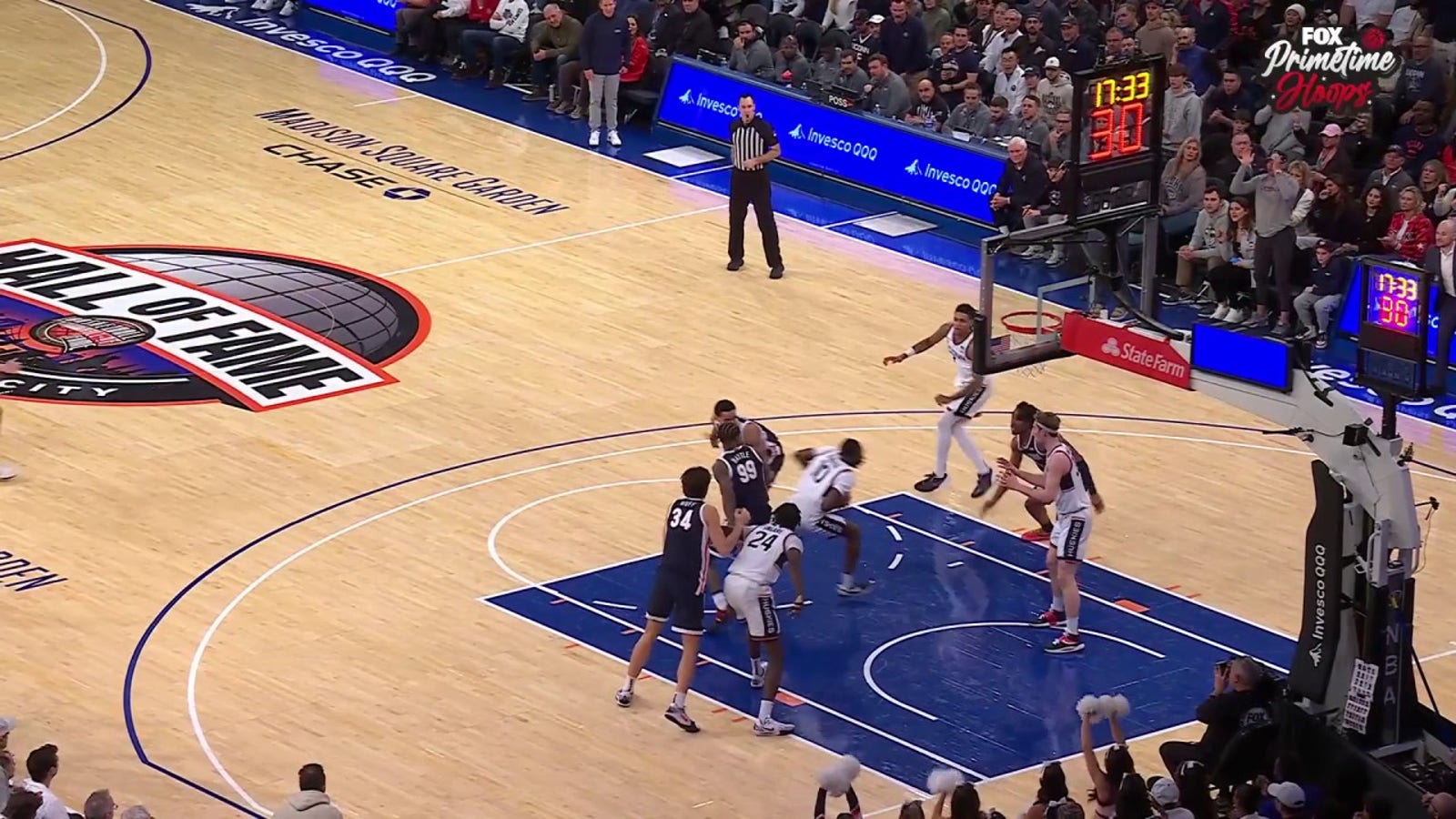 Hassan Diarra turns and finishes a contact layup, extending UConn's lead over Gonzaga