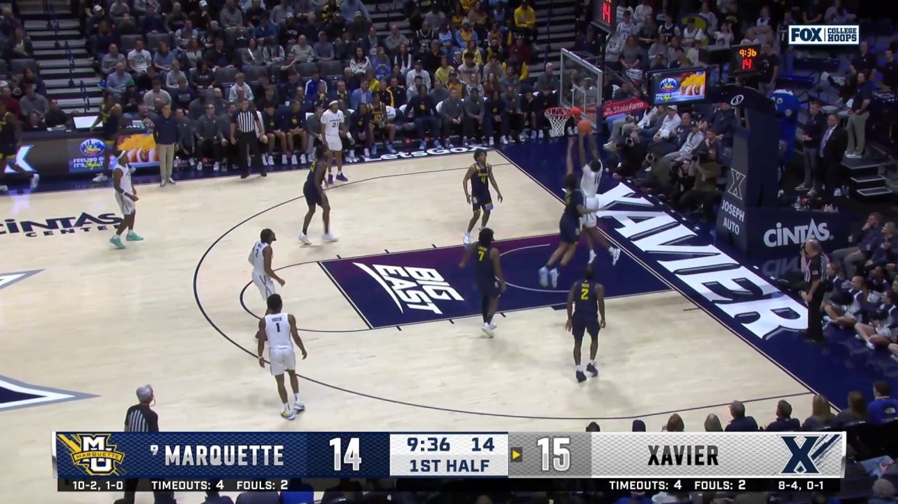 Cam Fletcher goes baseline for a strong dunk to extend Xavier's lead over No. 9 Marquette