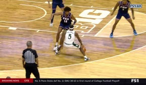 Tre Holloman's AMAZING ankle-breaking move leads to three-pointer, extending Michigan State's lead over FAU