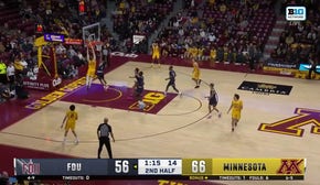 Parker Fox throws down a strong two-handed slam to seal Minnesota's 74-60 victory over FDU