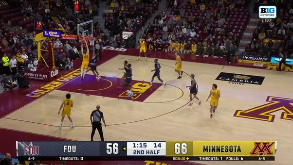 Parker Fox throws down a strong two-handed slam to seal Minnesota's 74-60 victory over FDU