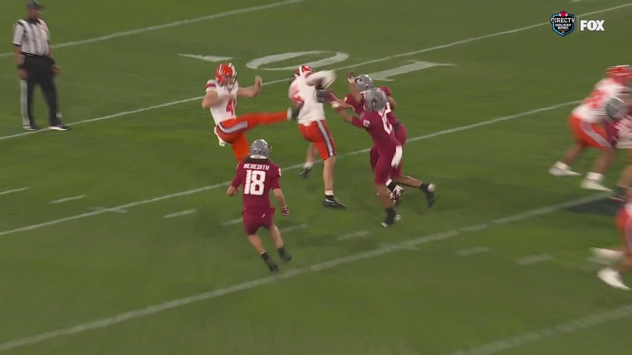 Washington State takes a 21-14 lead over Syracuse after a blocked punt and Josh Meredith recovery