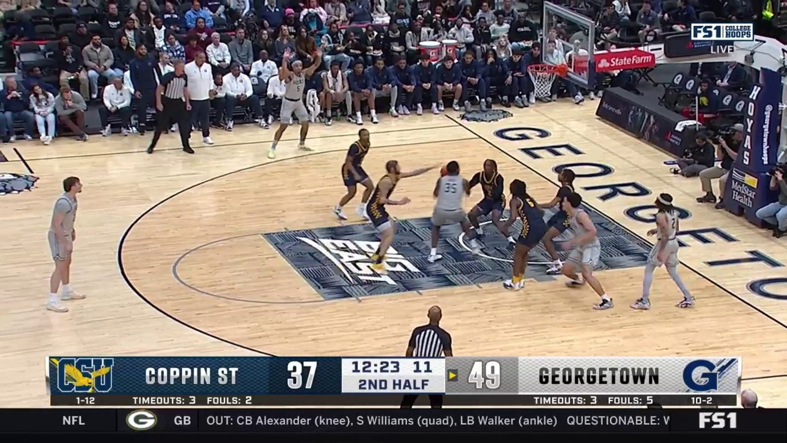 Georgetown's Thomas Sorber goes up big and finishes the layup hard and 1 against Coppin State