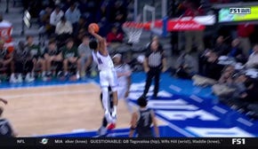 CJ Gunn throws down a NASTY and-1 dunk as DePaul extends lead over Loyola  