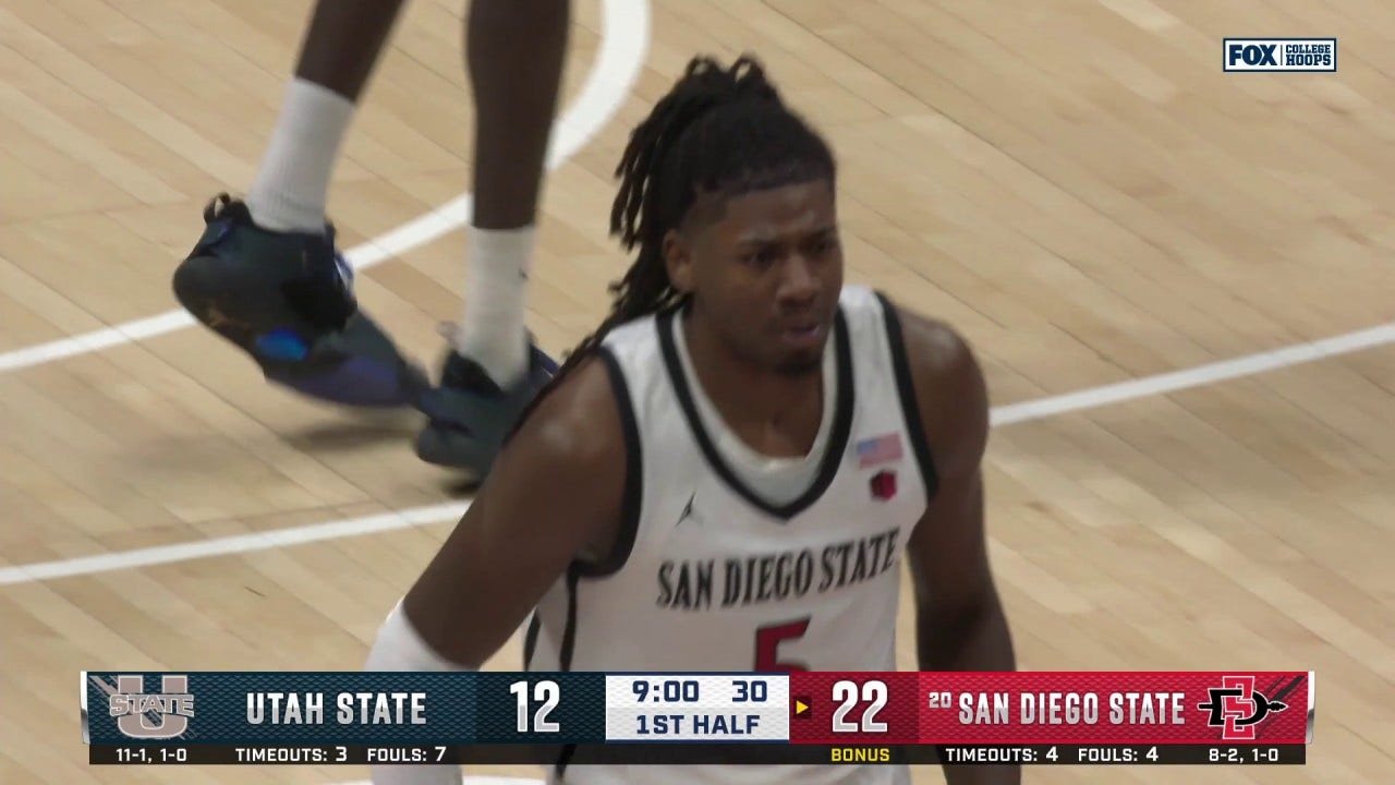 Pharaoh Compton throws down a dunk, extending San Diego State's lead over Utah State