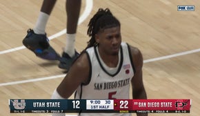 Pharaoh Compton throws down a dunk, extending San Diego State's lead over Utah State