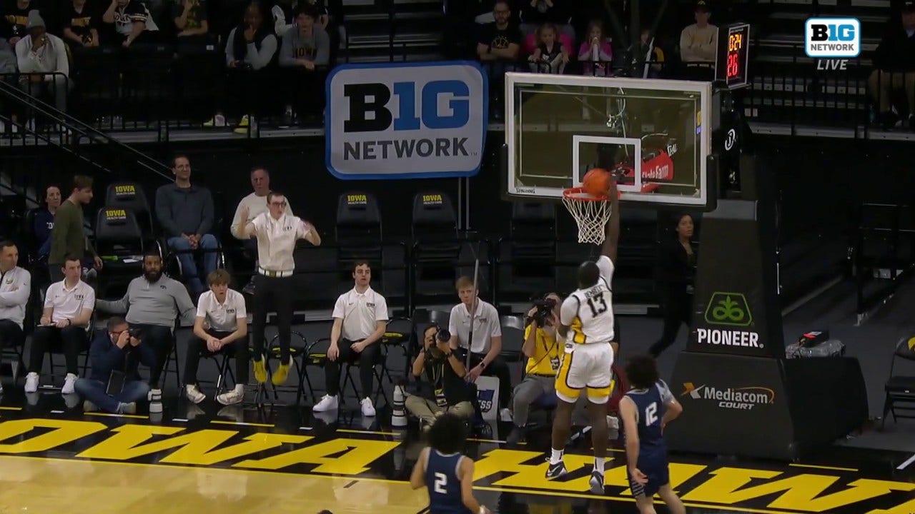 Ladji Dembele throws down fast break slam to extend Iowa's lead over New Hampshire