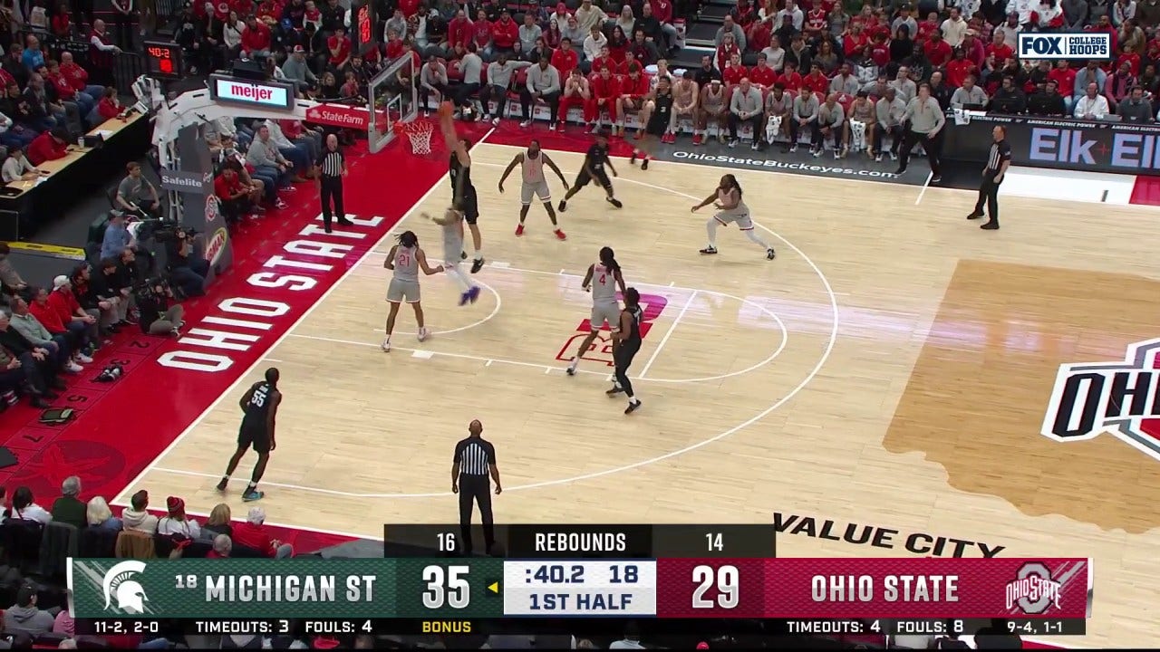 Szymon Zapala throws down the alley-oop, extending Michigan State's lead vs. Ohio State