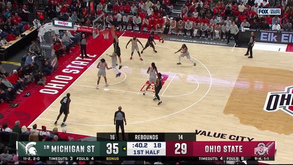 Szymon Zapala throws down the alley-oop, extending Michigan State's lead vs. Ohio State