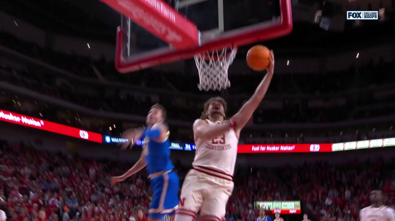 Andrew Morgan intercepts pass and finishes smooth reverse layup to extend Nebraska's lead over UCLA