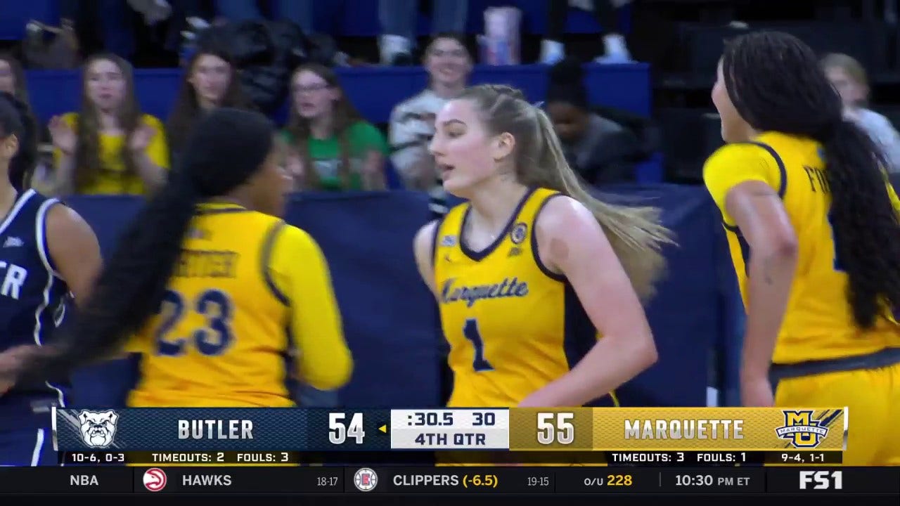 Lee Volker finishes the layup to help Marquette defeat Butler, 57-54