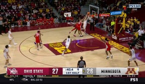 Parker Fox rises for the two-handed slam, giving Minnesota lead over Ohio State