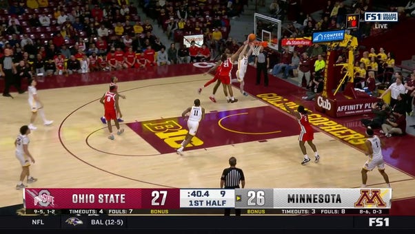 Parker Fox rises for the two-handed slam, giving Minnesota lead over Ohio State