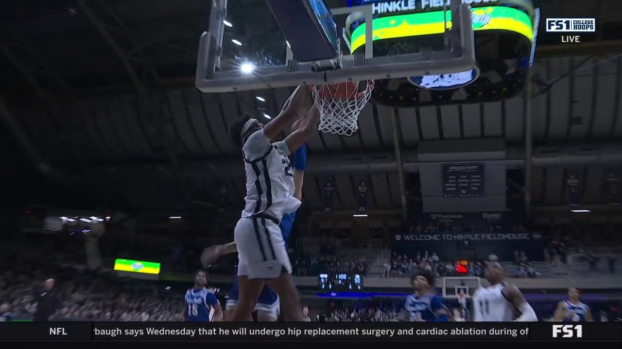 Andre Screen throws down an alley-oop dunk, extending Butler's lead over Seton Hall