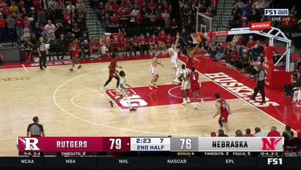 Dylan Harper finishes a tough layup, extending Rutgers' lead over Nebraska