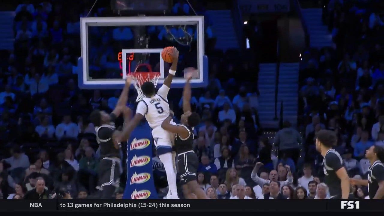 Villanova's Wooga Poplar POSTERIZES two defenders vs. Providence