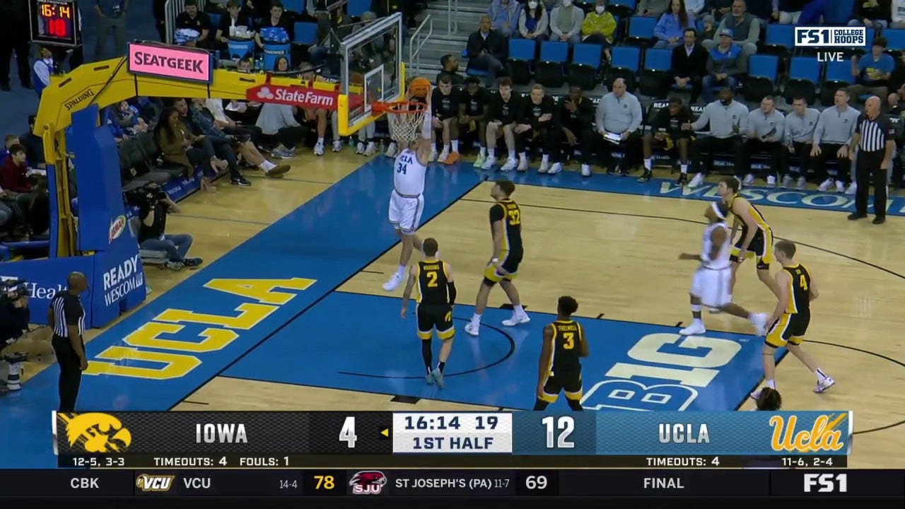 UCLA's Tyler Bilodeau throws down a dunk to extend lead vs. Iowa