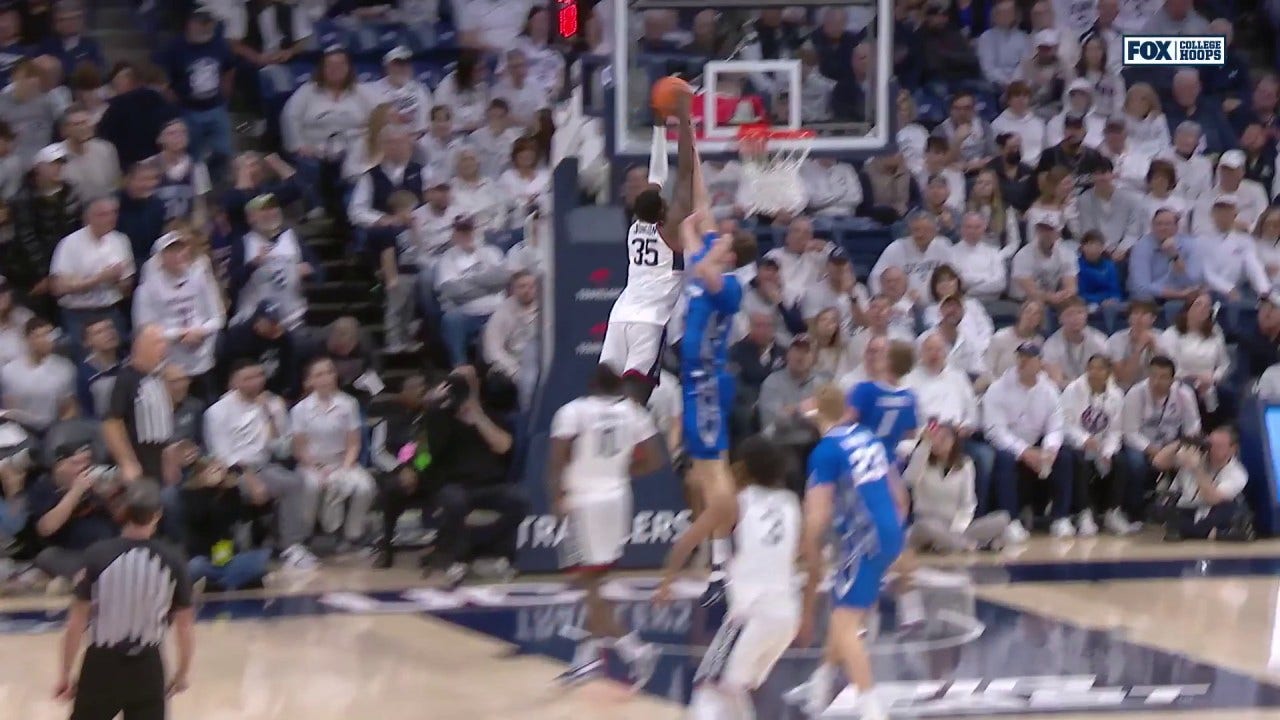 Samson Johnson posterizes Ryan Kalkbrenner to help UConn shrink Creighton's lead