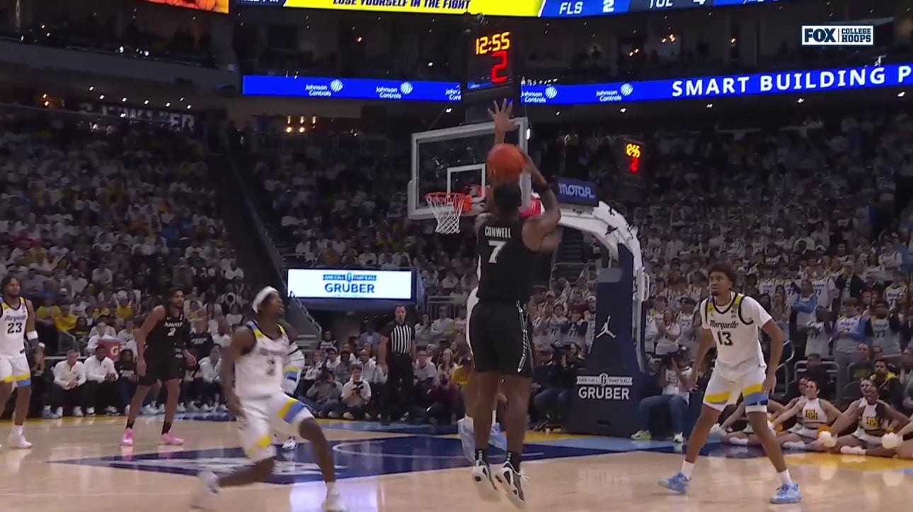 Marquette's Damarius Owens drains a three-pointer after recording a tough block on defense vs. Xavier