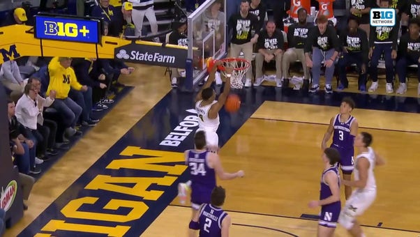 Michigan's Nimari Burnett throws down two-hand slam in overtime to extend lead against Northwestern