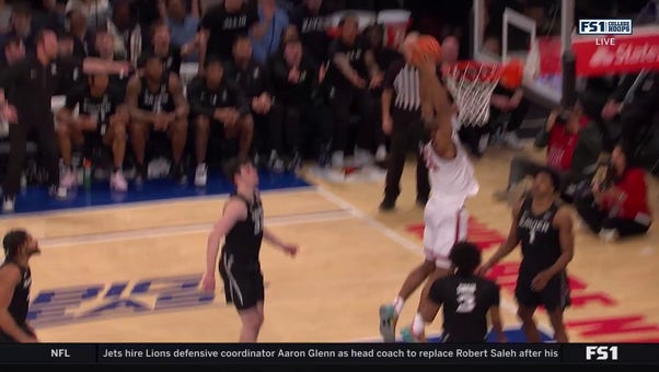 Zuby Ejiofor throws down strong dunk for St. John's after phenomenal save from Kadary Richmond to shrink Xavier's lead