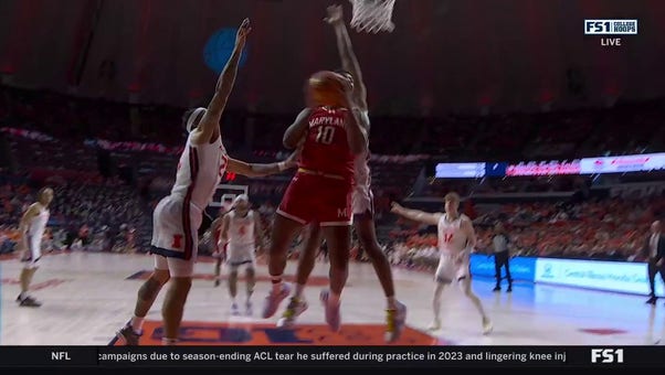 Julian Reese finishes through contact and gets the foul, extending Maryland's lead vs. Illinois