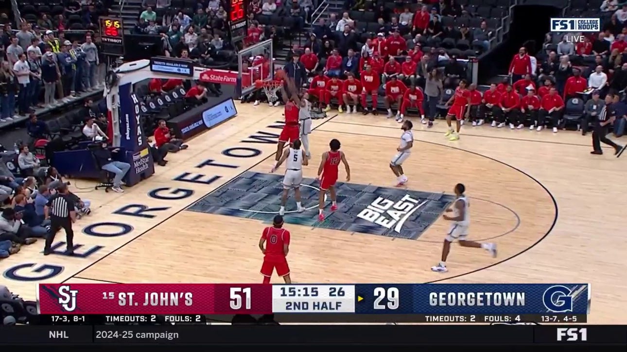 St. John's Zuby Ejiofor throws down a tough alley-oop dunk against Georgetown