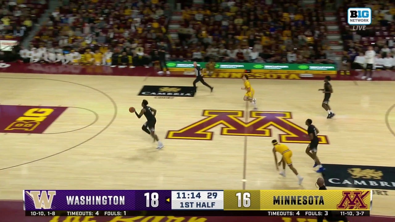 Washington's Great Osobor throws down a two-handed slam dunk after getting the steal vs. Minnesota