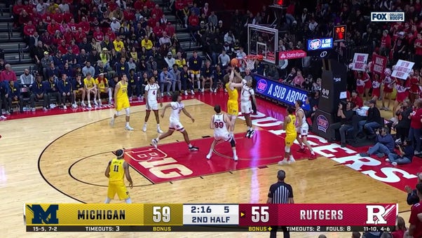 Danny Wolf scores layup off nice dish from Nimari Burnett to secure Michigan's 66-63 win over Rutgers