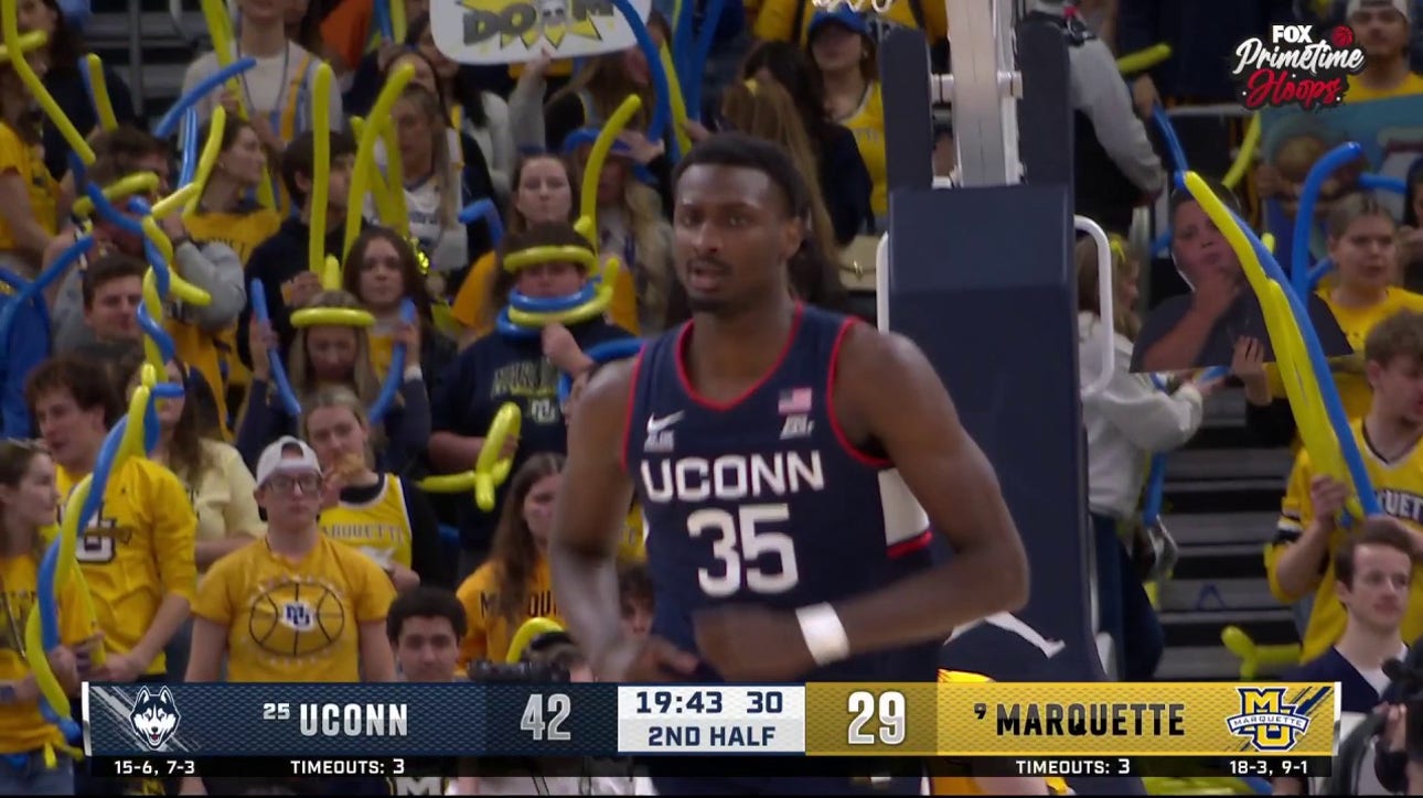 UConn's Samson Johnson throws down an emphatic jam vs. Marquette