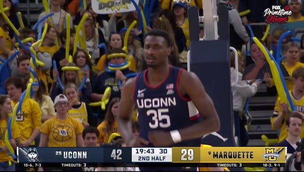 UConn's Samson Johnson throws down an emphatic jam vs. Marquette