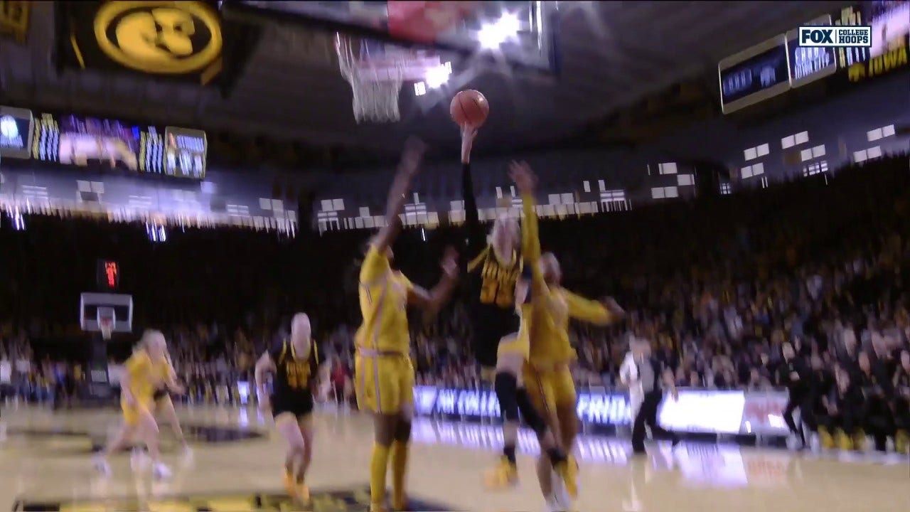 Lucy Olsen finishes tough and-1 layup, helping Iowa defeat No. 4 USC