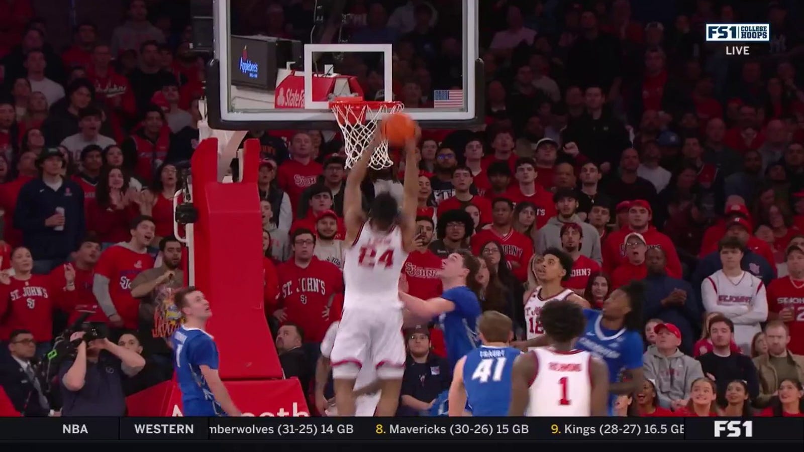 Zuby Ejiofor finishes a put-back dunk in St John's 79-73 win over Creighton