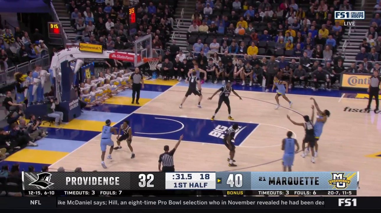 David Joplin hits a 3-pointer, extending Marquette's lead over Providence before halftime