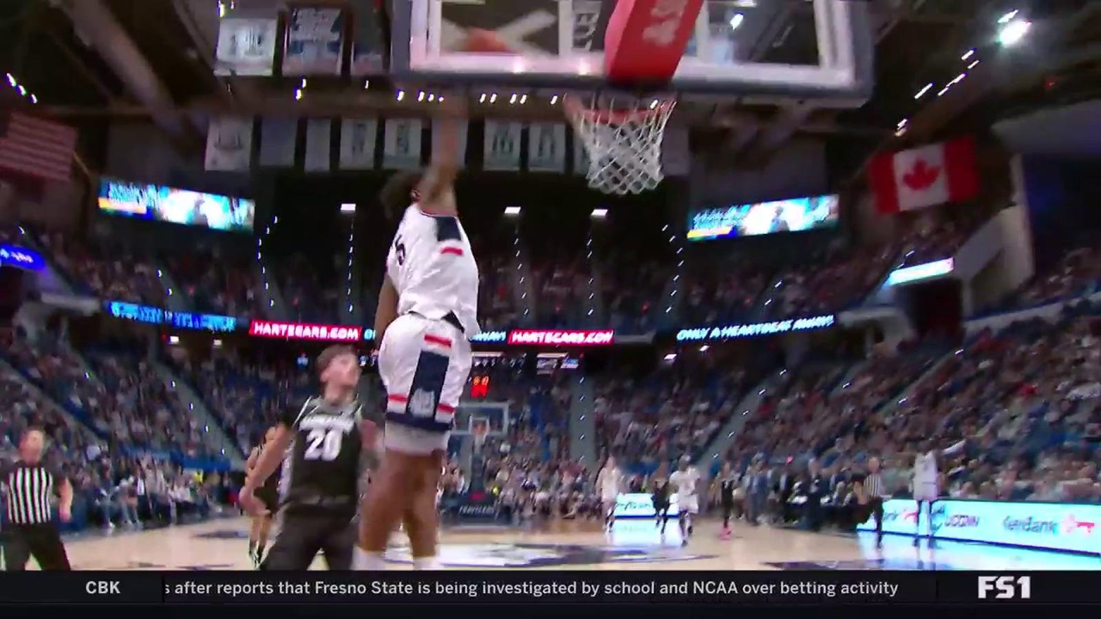 UConn's Tarris Reed Jr. forces a turnover and throws down a dunk against Georgetown