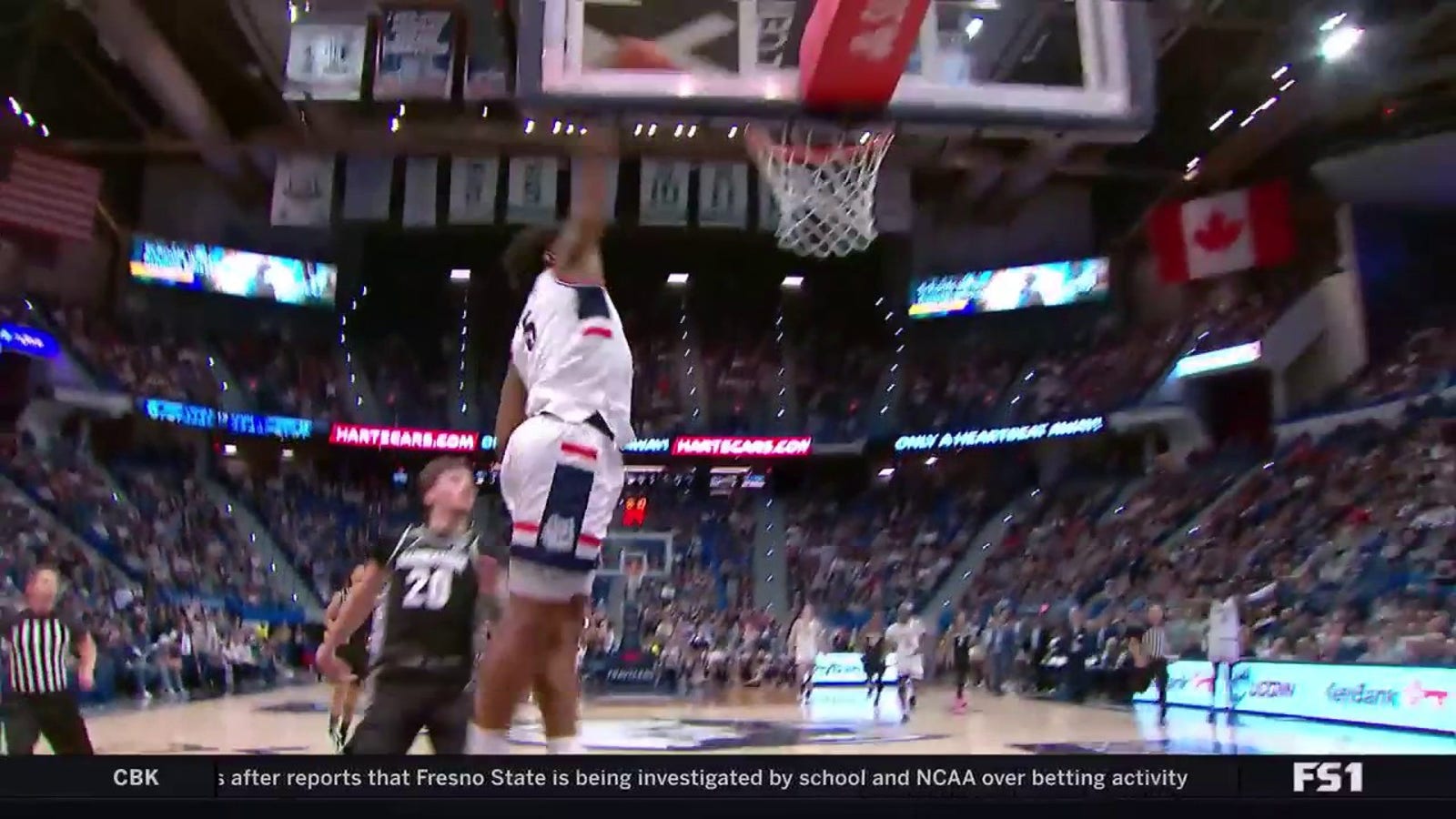 Tarris Reed Jr. of Uconn forces a turnover and throws a dash against Georgetown