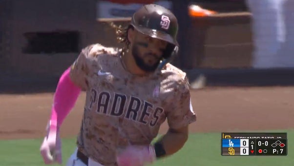 Padres' Fernando Tatís Jr. lauches a solo homer to dead center field in the first inning against the Dodgers