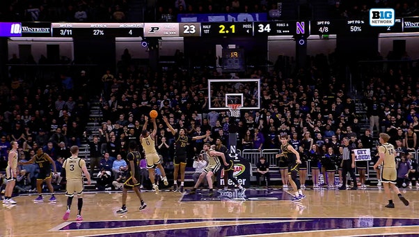 Purdue's C.J. Cox sinks in midjump fadeaway at the buzzer vs. Northwestern