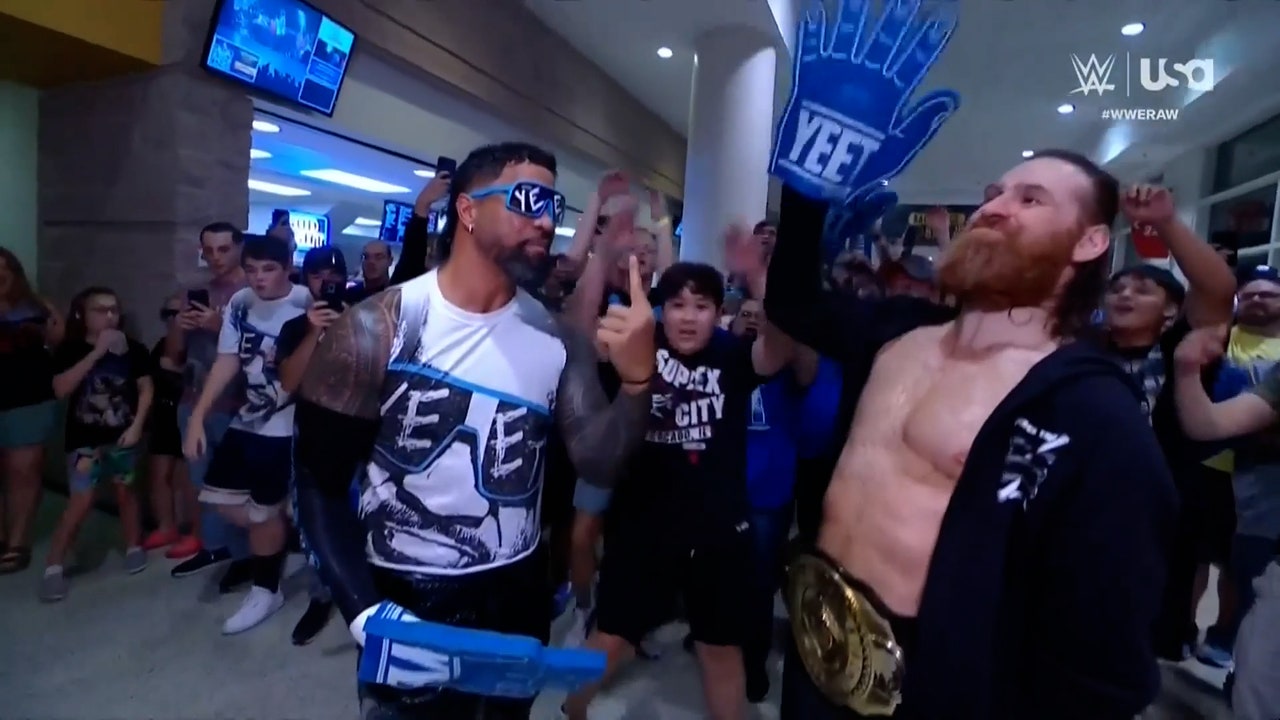 Jey Uso and Sami Zayn enter through the crowd on Raw in  Green Bay, Wisconsin | WWE on FOX