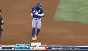 Adolis García hammers his 13th homer of the year to deep left field, extending the Rangers' lead against the Marlins