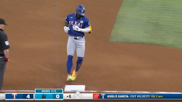 Adolis García hammers his 13th homer of the year to deep left field, extending the Rangers' lead against the Marlins