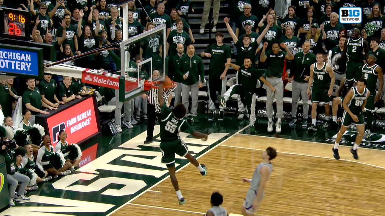 Michigan State's Coen Carr takes flight with POWERFUL fastbreak dunk vs. Northwestern