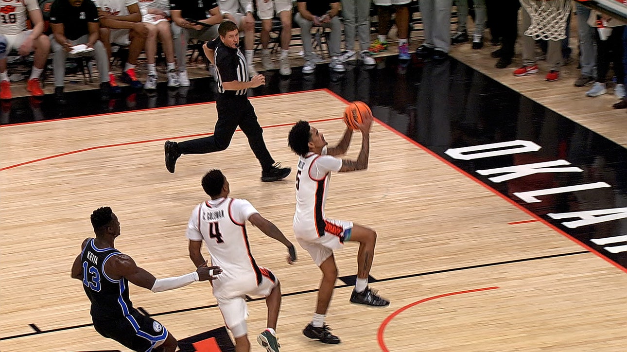 Oklahoma State's Vyctorius Miller HAMMERS full court dunk to seal upset win over BYU 