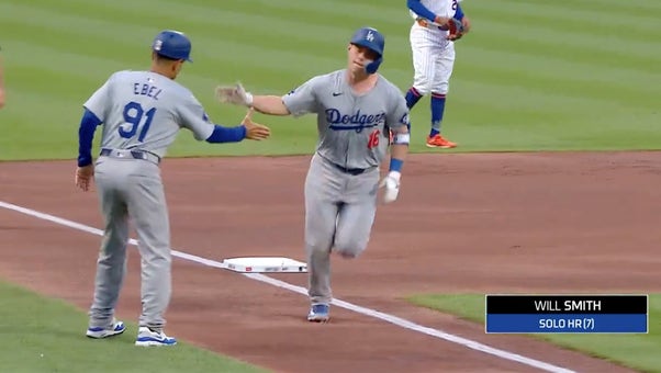 Dodgers' Will Smith launches a solo blast in the first inning against the Mets
