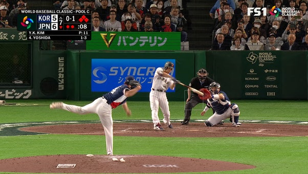 Japan's Masataka Yoshida hits single, driving in two runs, extending lead over Republic of Korea