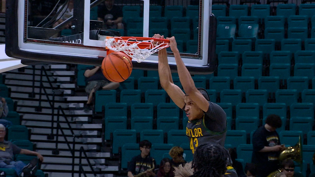 Obi Agbim throws halfcourt lob to Cameron Carr for STRONG slam dunk, extending Baylor's lead over Minnesota